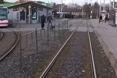 All Aboard the Hilarious Hijinks Express: Man Halts Train to Play Real-Life 'Frogger'!