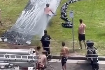 Firefighters Bring Joy and Relief to Sydney Locals with Waterslide Fun Amid a Heatwave